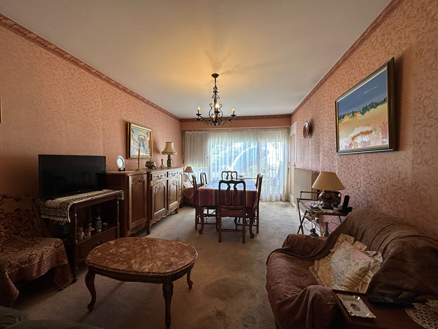 Photo Appartement 3 pièces à Saint-Jean-de-la-Ruelle, Rez-de-chaussée avec balcon, cave et parking image 2/6