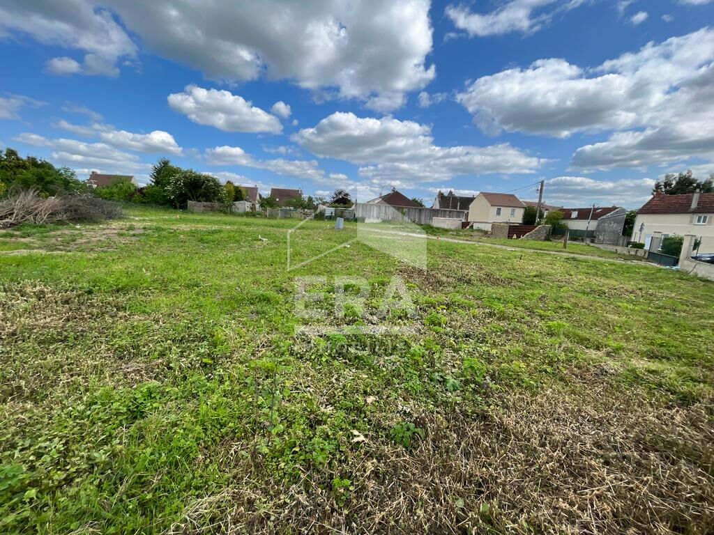 Photo TERRAIN PLAT  ET VIABILISE - de plus 510 m² - OZOUER LE VOULGIS image 3/4