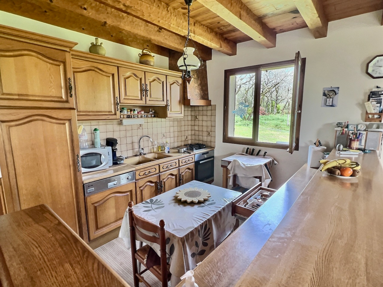 Photo A quelques minutes de Tournon D'Agenais, maison avec une vie de plain pied  d'environ 115m2 sur un parc d'environ  14 000m2  boisé. Vous apprécierez son environnement , sa grande véranda, son sous-sol total  d'environ 70m2 et sa proximité d'une bastide du image 5/6