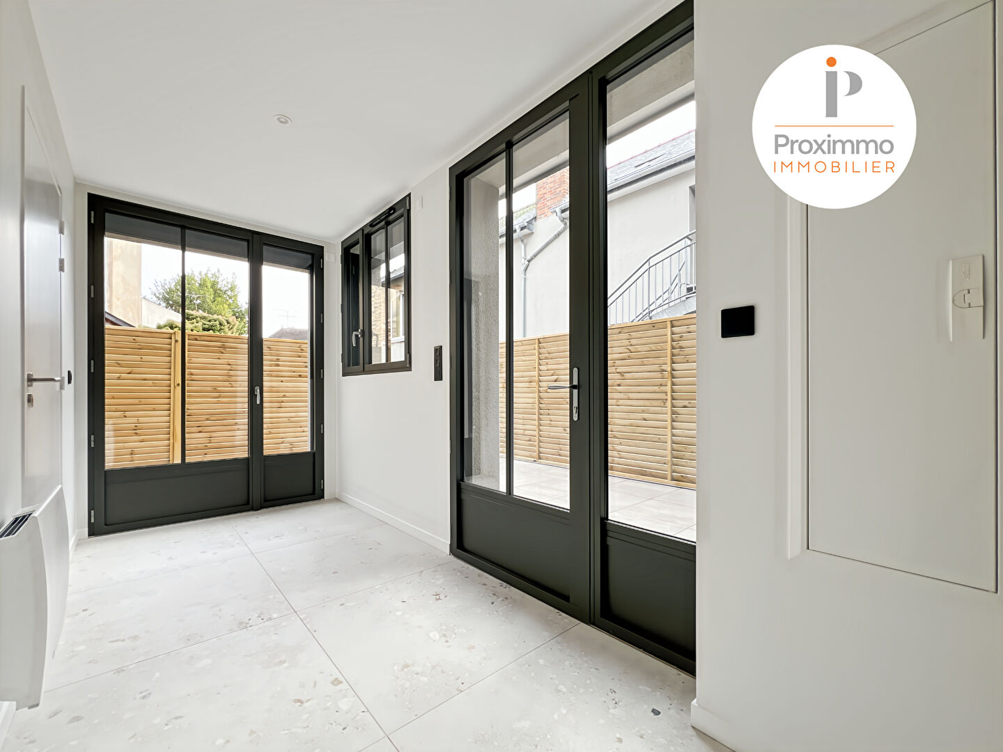 Photo Maison d'architecte réhabilitée 119 m²  Cadre calme  Stationnement - domotique Hyper centre Bain de Bretagne image 2/6