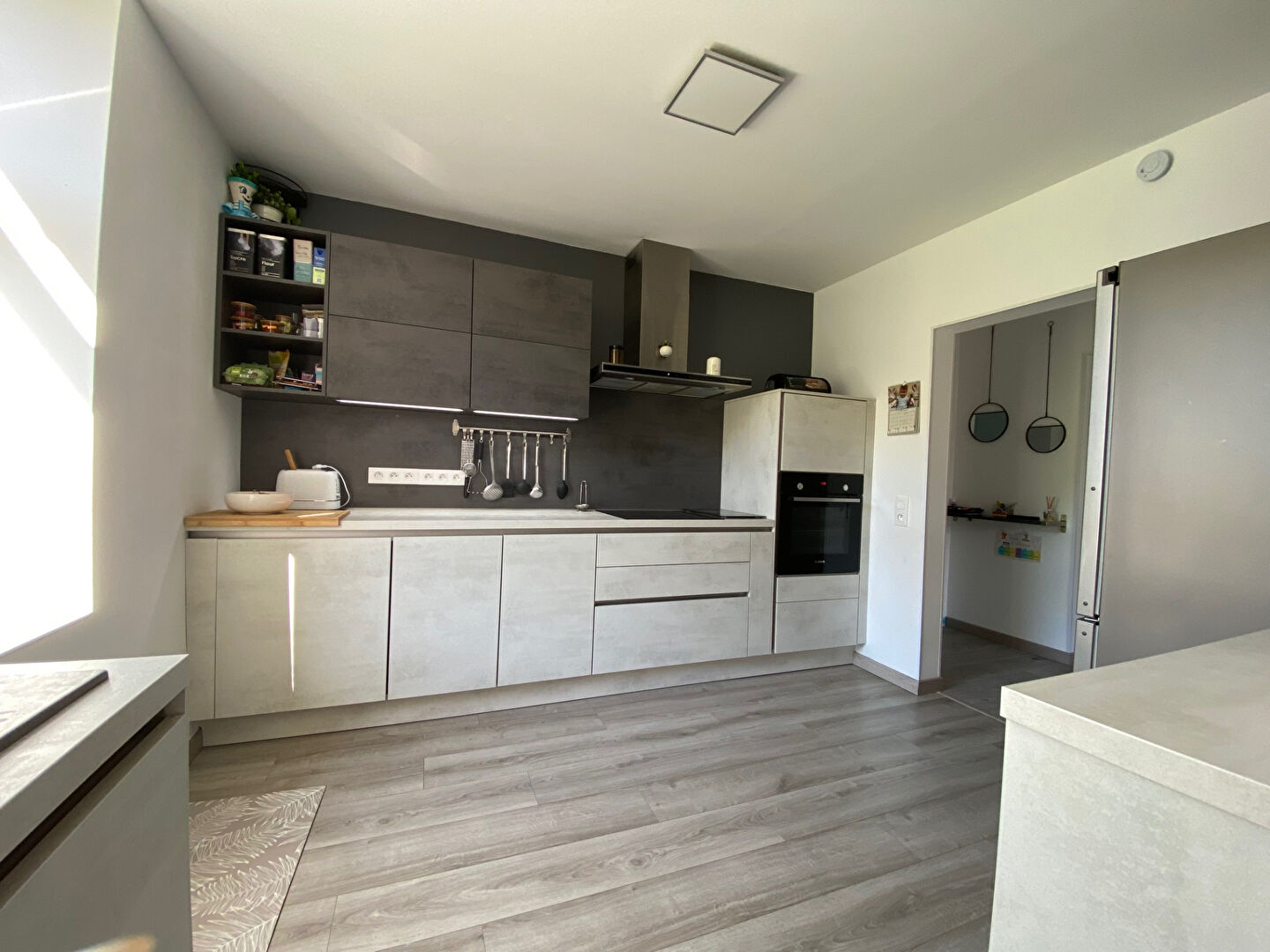 Appartement de type duplex avec terrasse, verger et garage