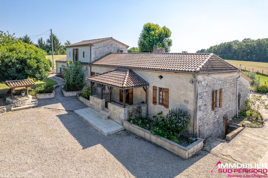 Beautiful stone ensemble with outbuildings