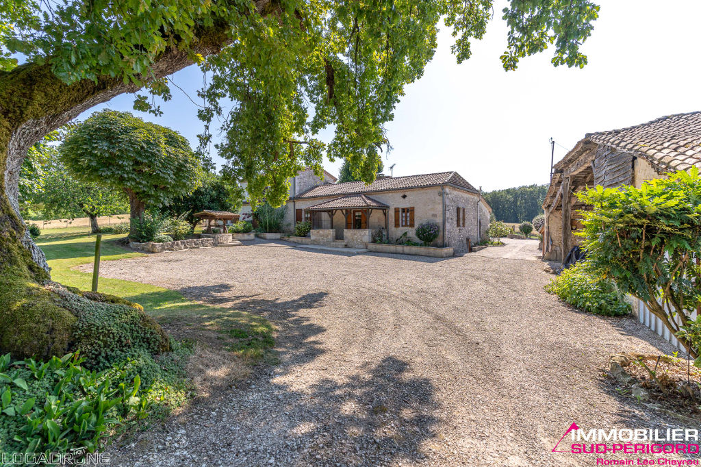 Beautiful stone ensemble with outbuildings