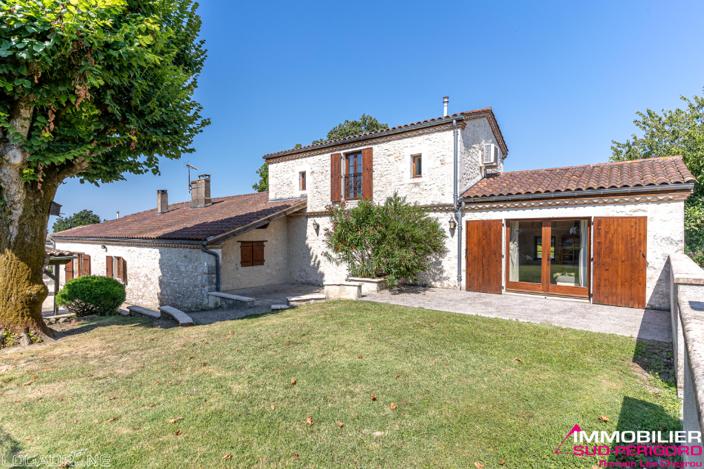 Beautiful stone ensemble with outbuildings