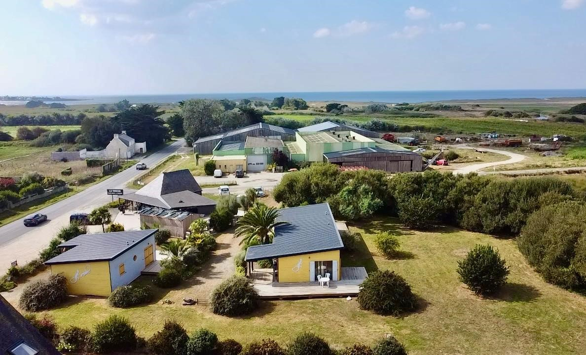 Photo LA TORCHE - Propriété composée de 3 chalets en bois image 2/6