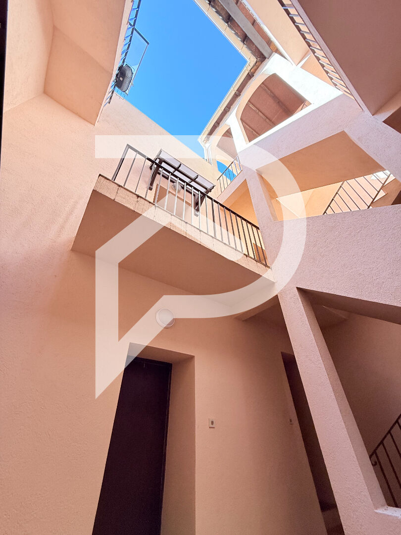 Photo Immeuble de 11 appartements et deux commerces image 5/6