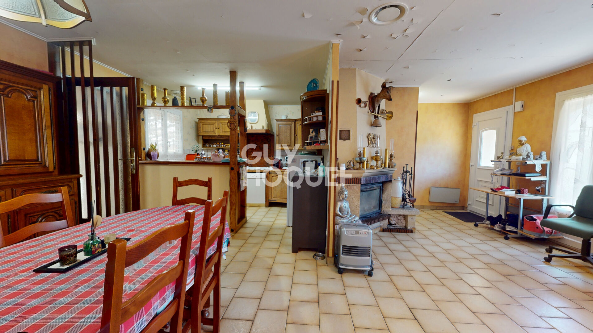 Maison trois chambres avec garage et carport