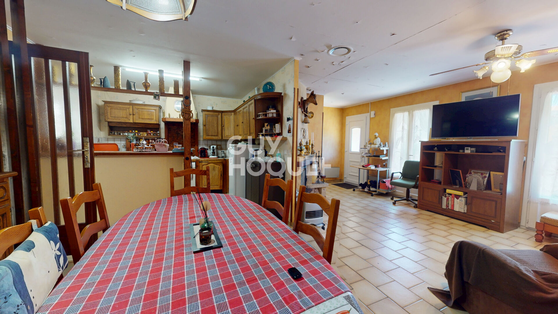 Maison trois chambres avec garage et carport