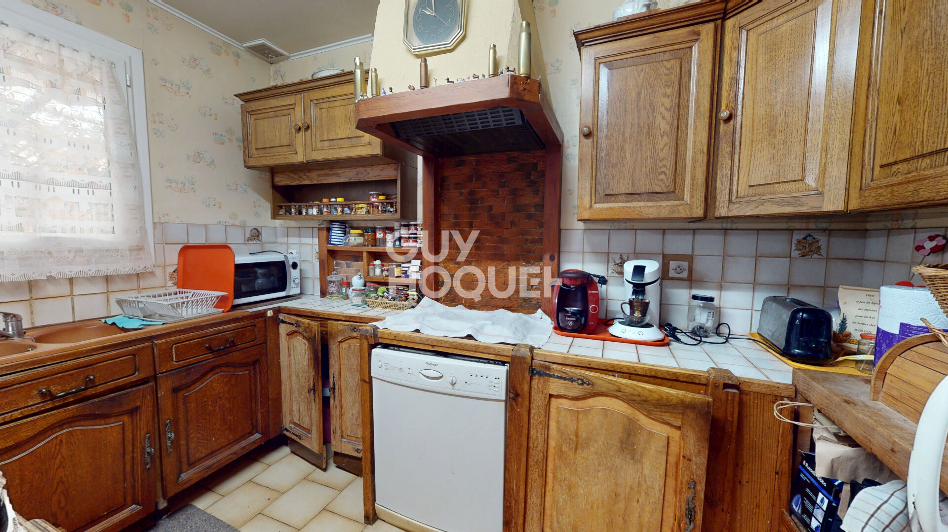 Maison trois chambres avec garage et carport