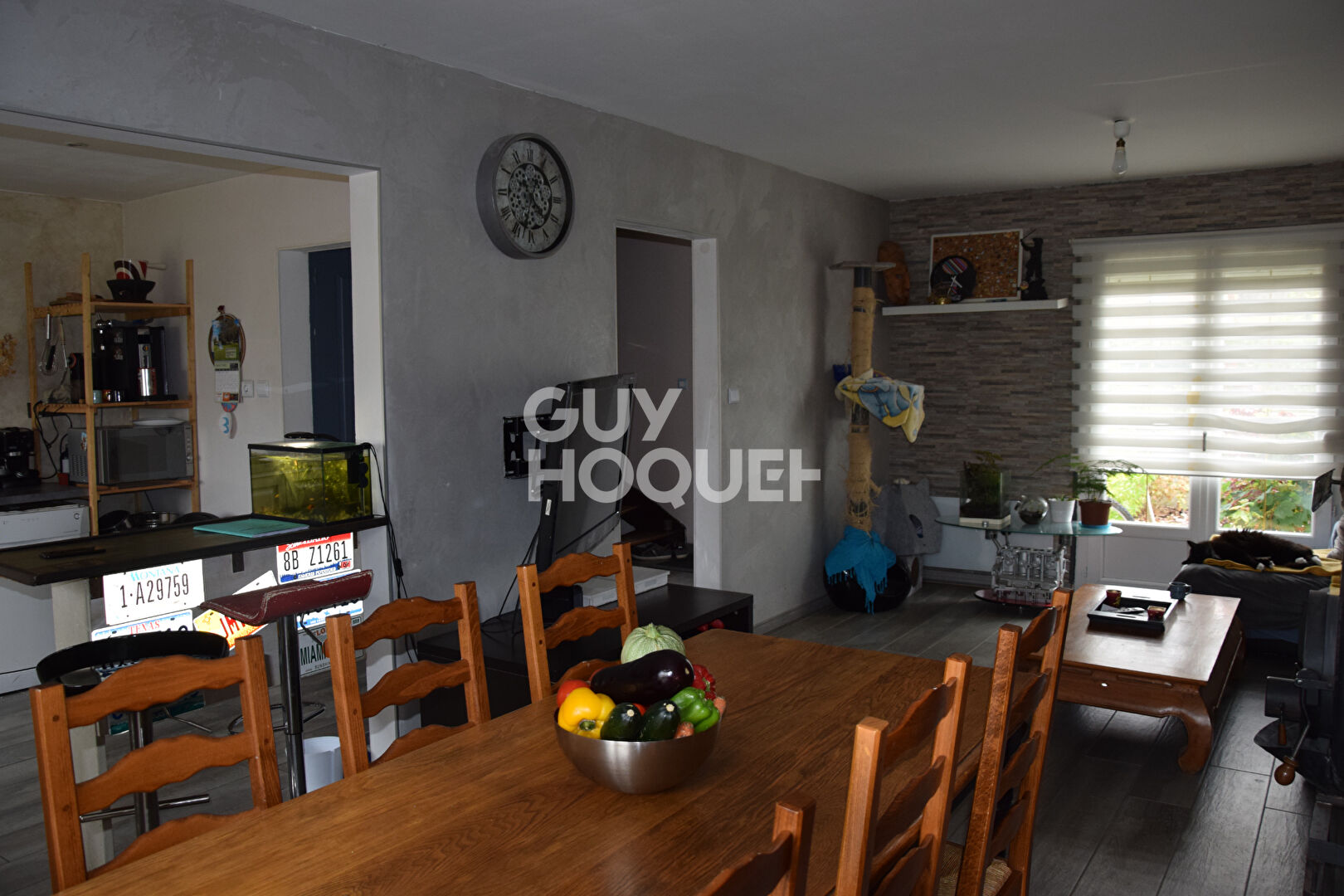 A VENDRE - Maison semi individuelle - 3 chambres - Jardin - Garage.