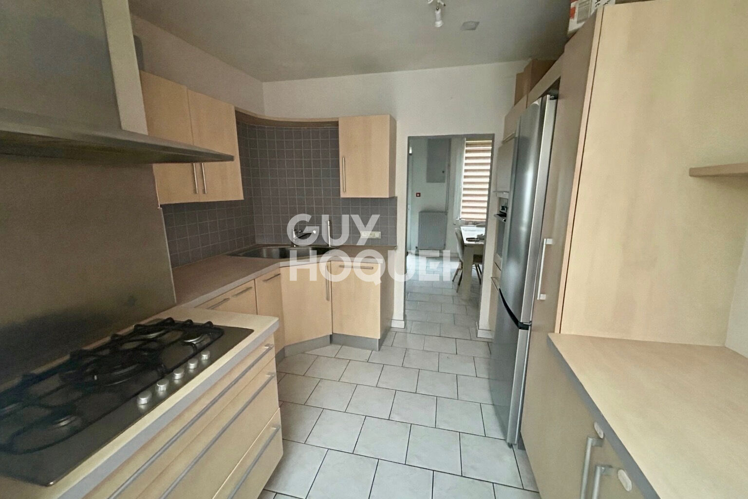 A VENDRE à CALAIS - Maison semi-mitoyenne - 2 chambres - Cour.