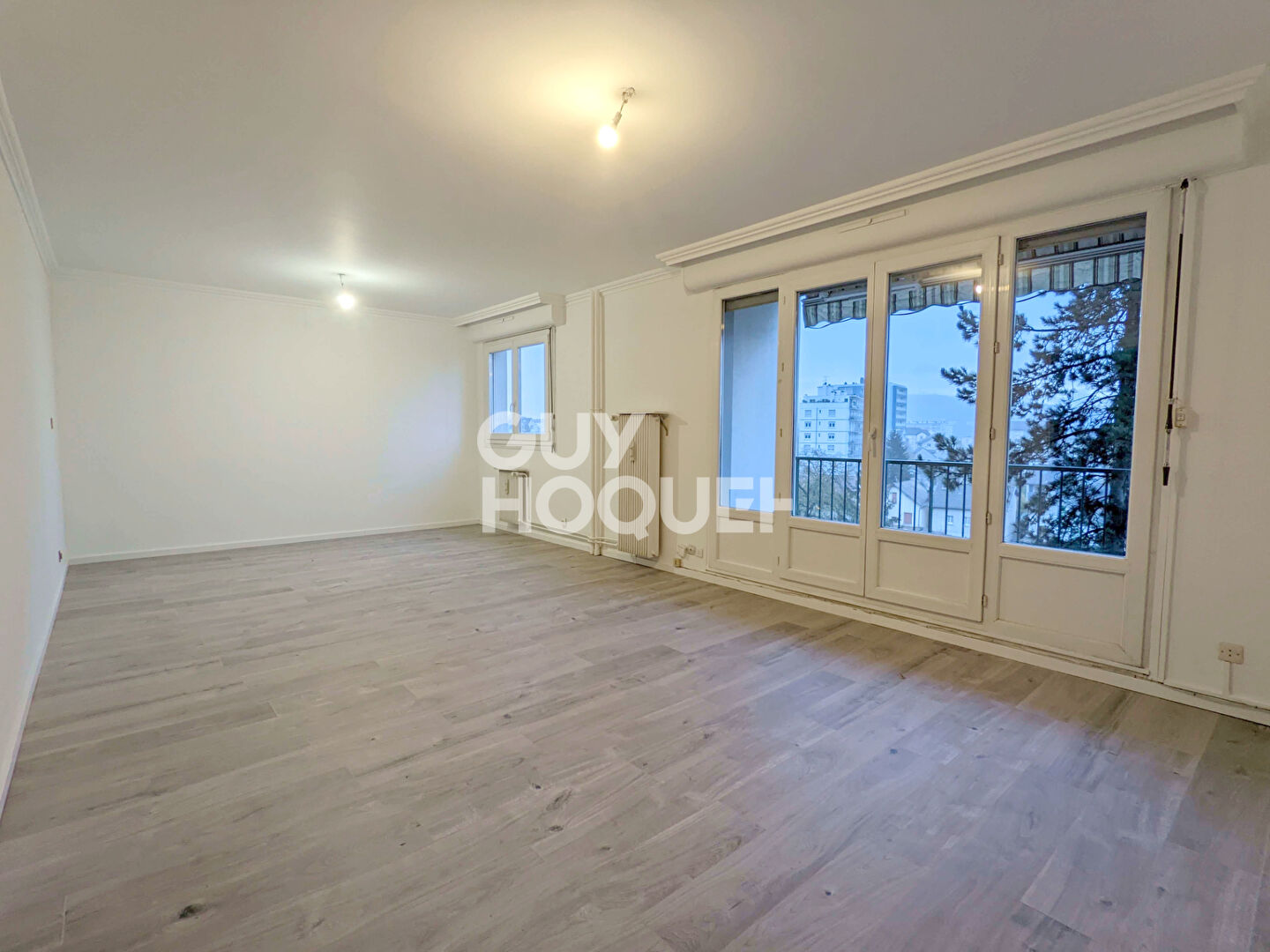 Appartement lumineux avec balcon et parking - quartier Saint-Claude