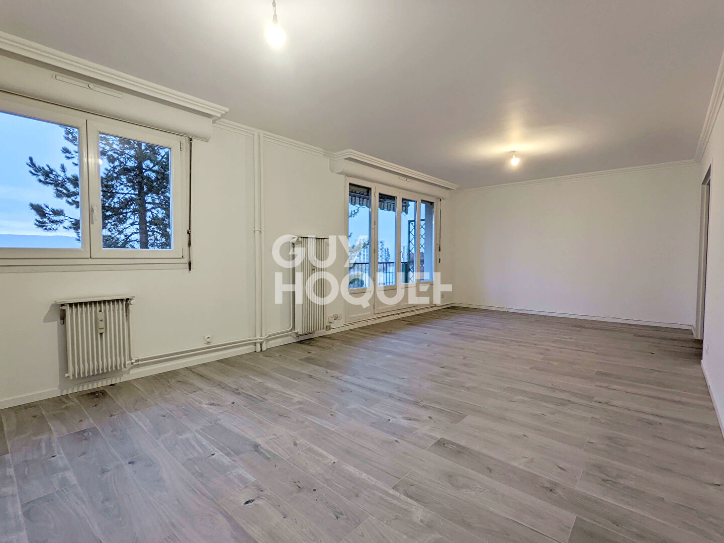 Appartement lumineux avec balcon et parking - quartier Saint-Claude