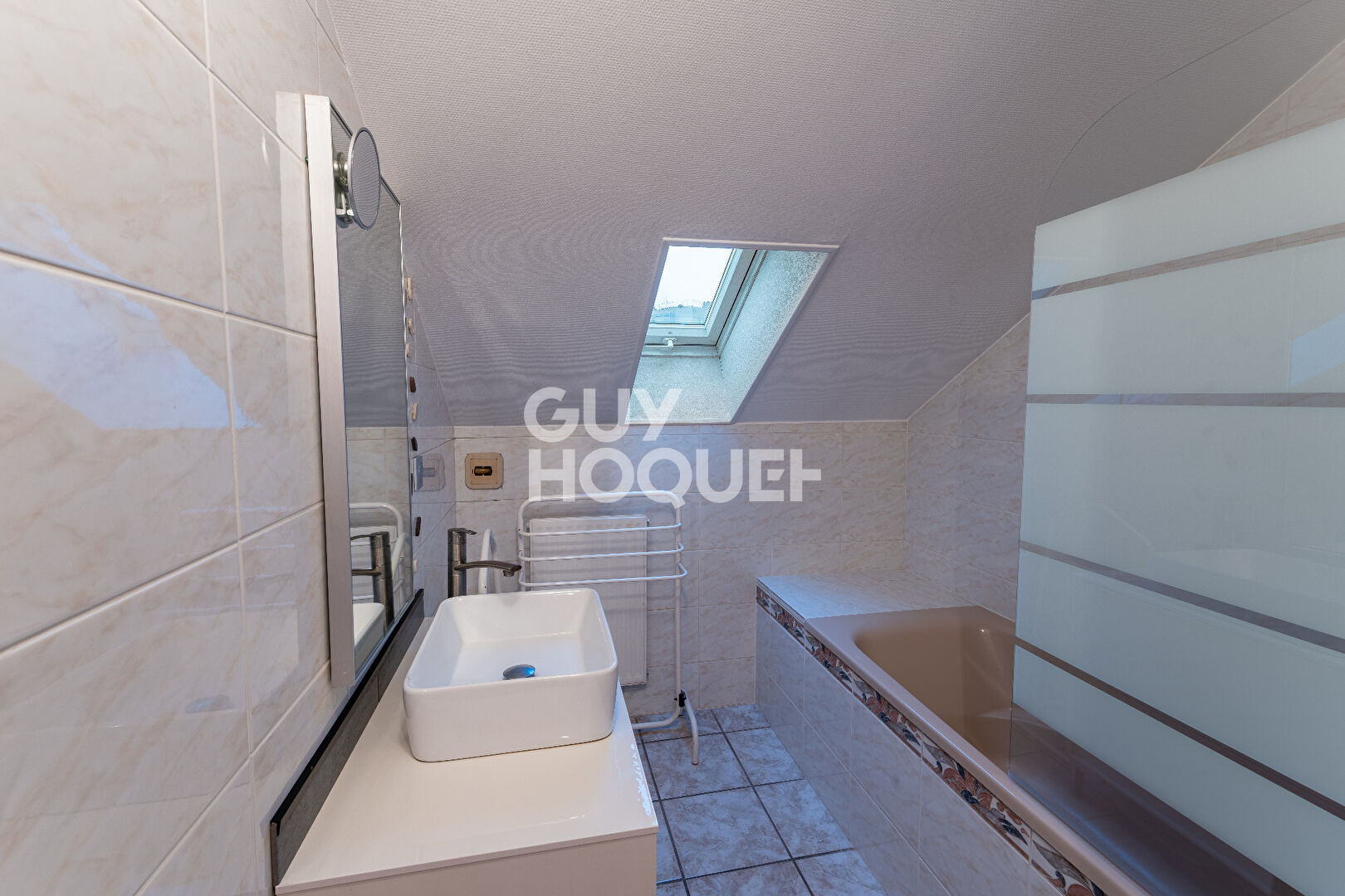 Dernier étage avec vue dégagée pour cet appartement familial