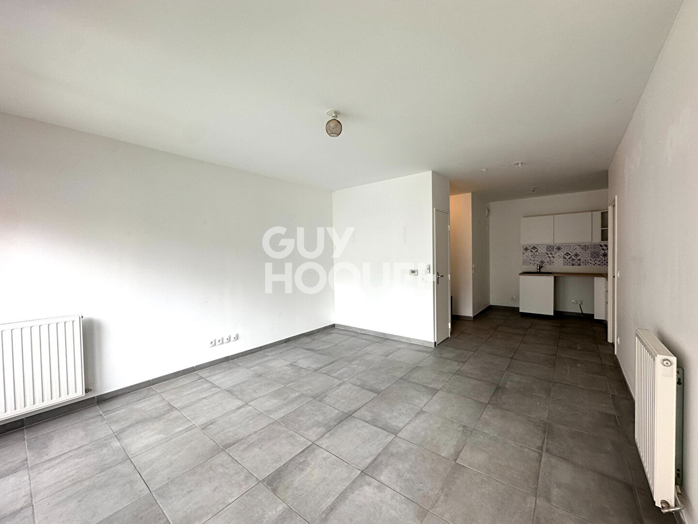 Plateau Croix-Rousse - Appartement avec loggia et parking - résidence récente