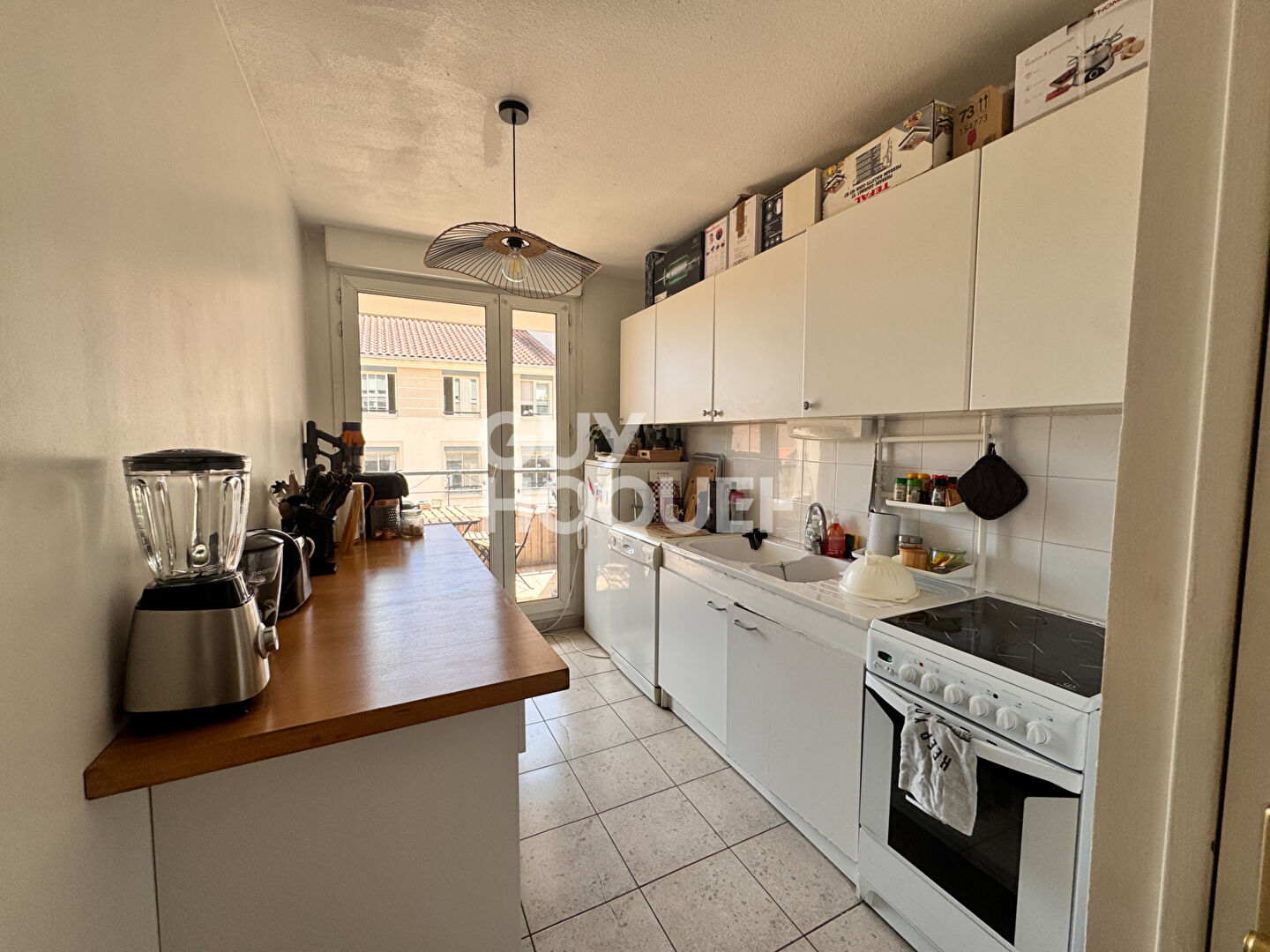 Appartement  3 pièce(s) avec balcon - garage- cave vendu loué