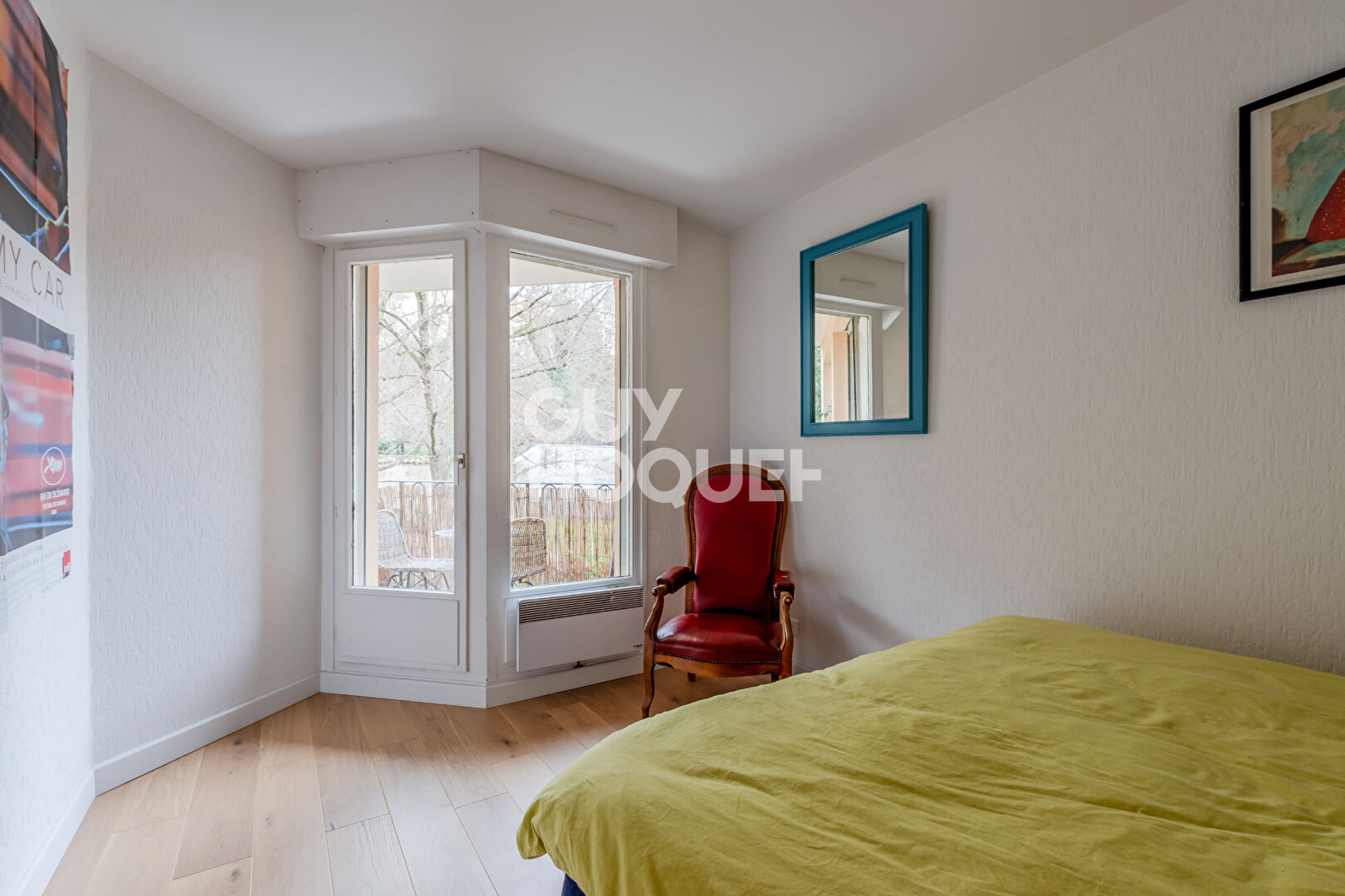 Appartement  2 chambres balcon vue sur jardin- une cave 
