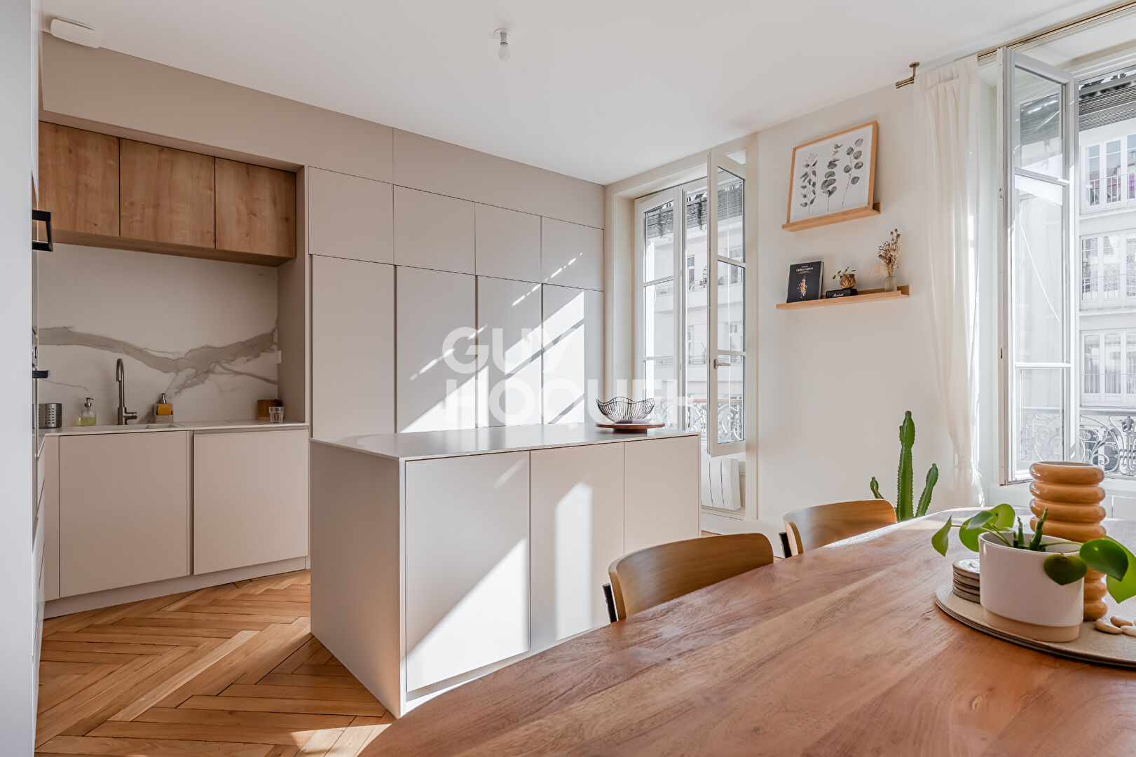 Appartement  traversant - vue dégagée - ascenseur - cave