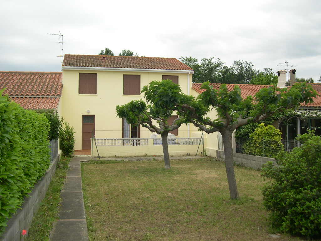 Appartement T3 dans maison avec garage et jardin