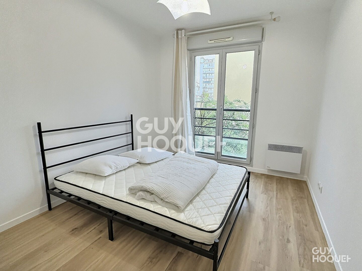 À louer : Appartement 2 pièces à Aubervilliers avec balcon et parking