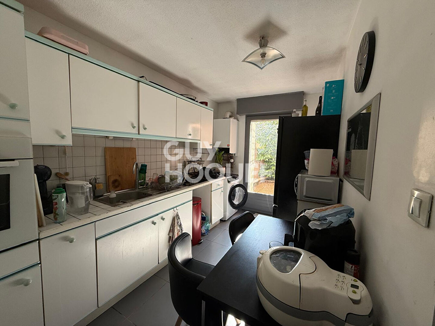 Appartement  2 pièces avec terrasse et place de parking