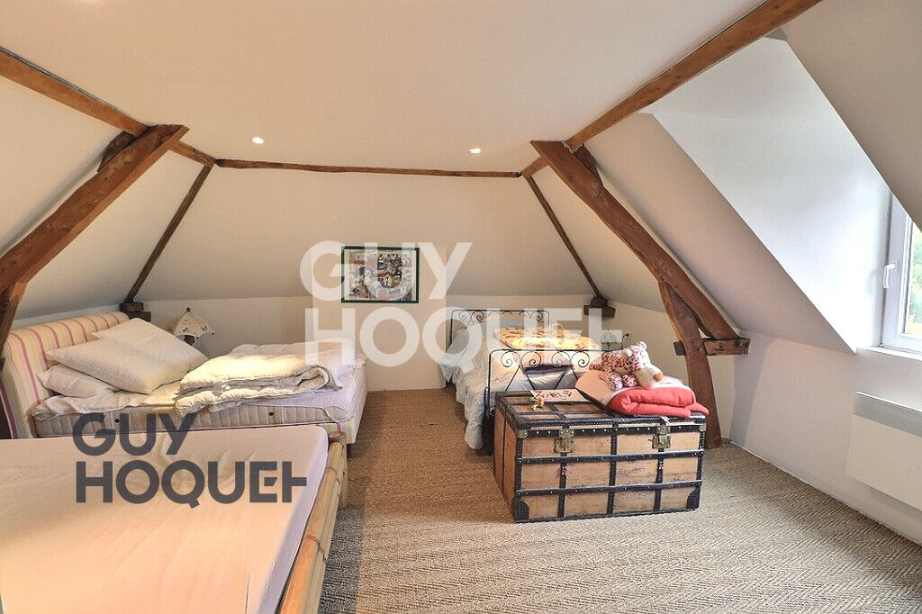 Charmante maison de caractère en briques à 10 minutes de Bernay, sur grand terrain arboré