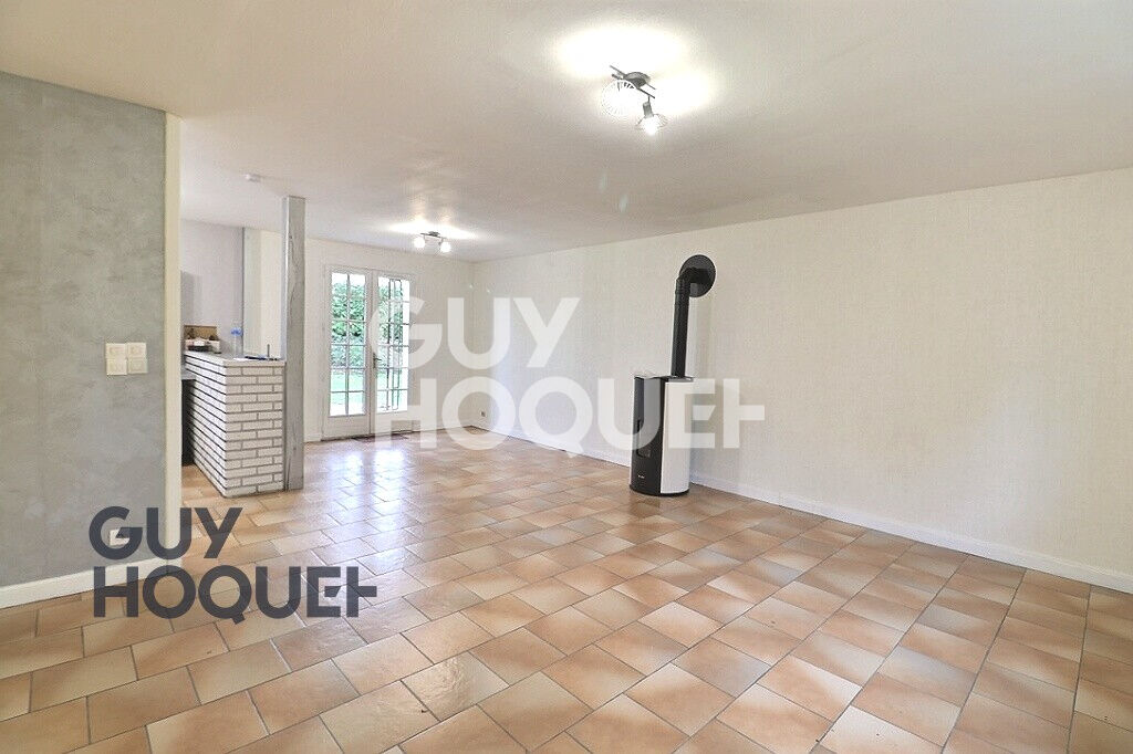 Maison de plain-pied avec grand terrain