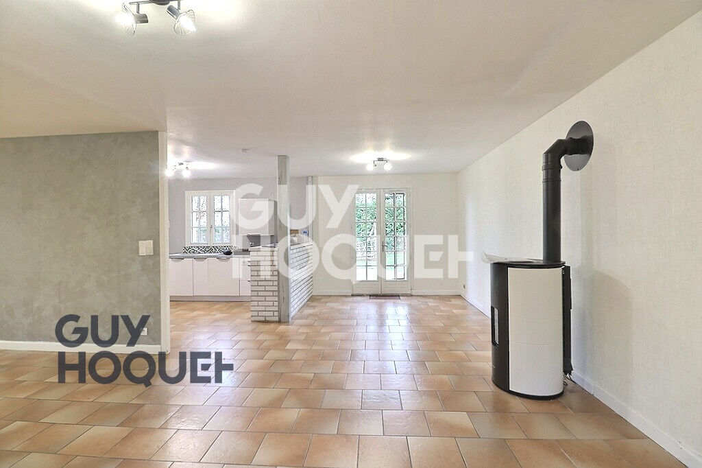 Maison de plain-pied avec grand terrain