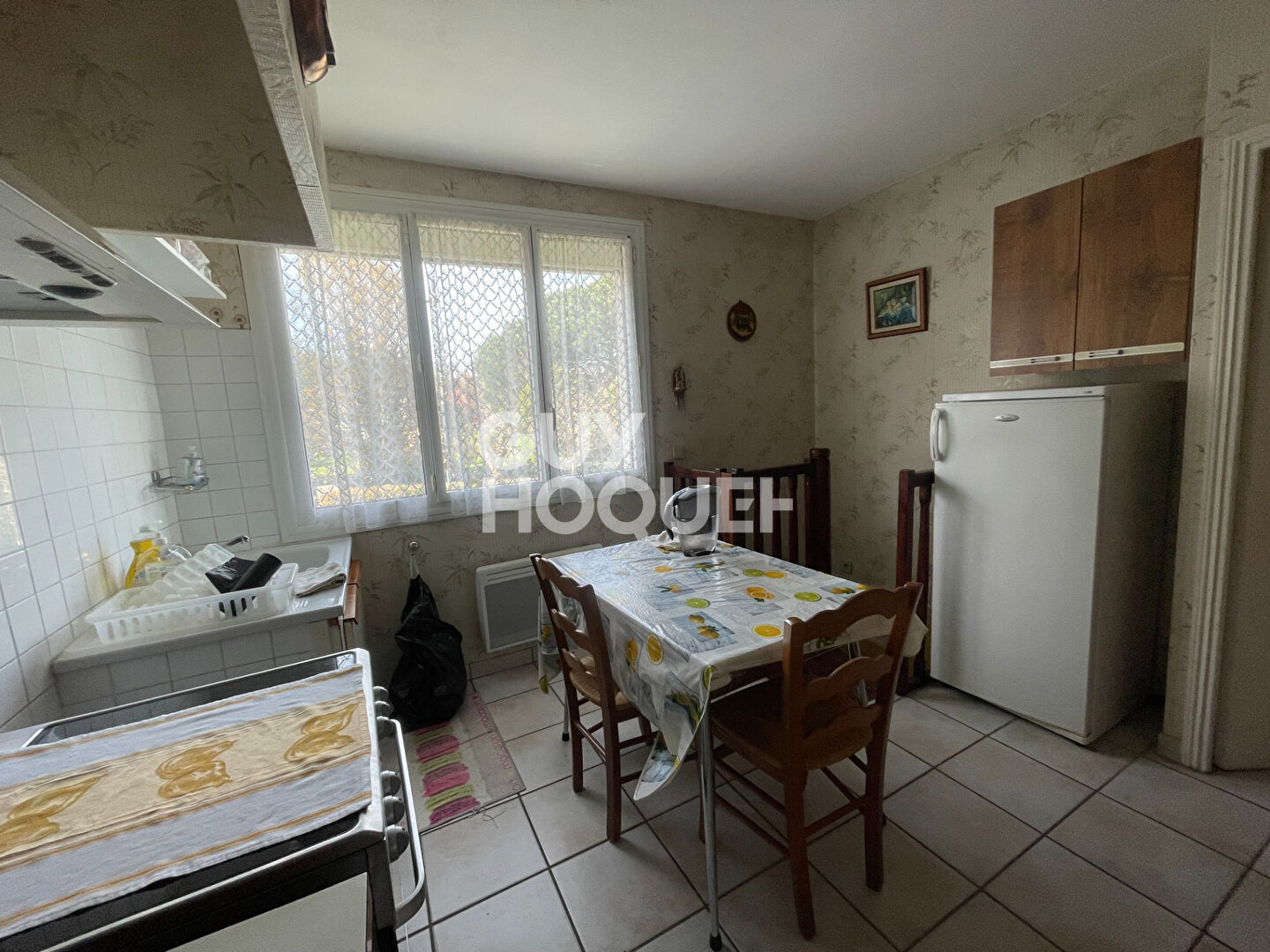 Maison familiale avec grand terrain et garage