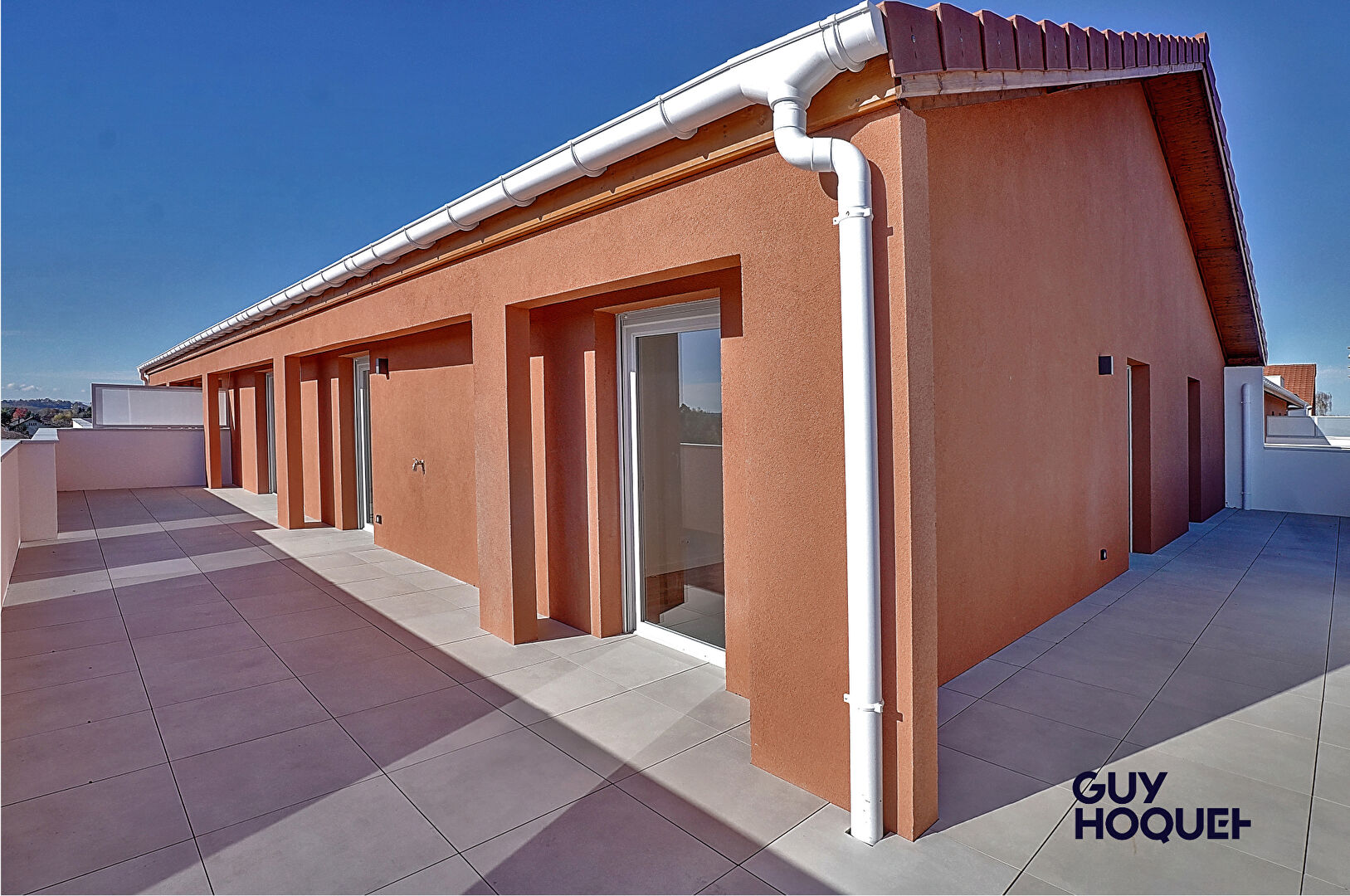 Appartement  en attique 4 pièces de 91 m²  avec double garage