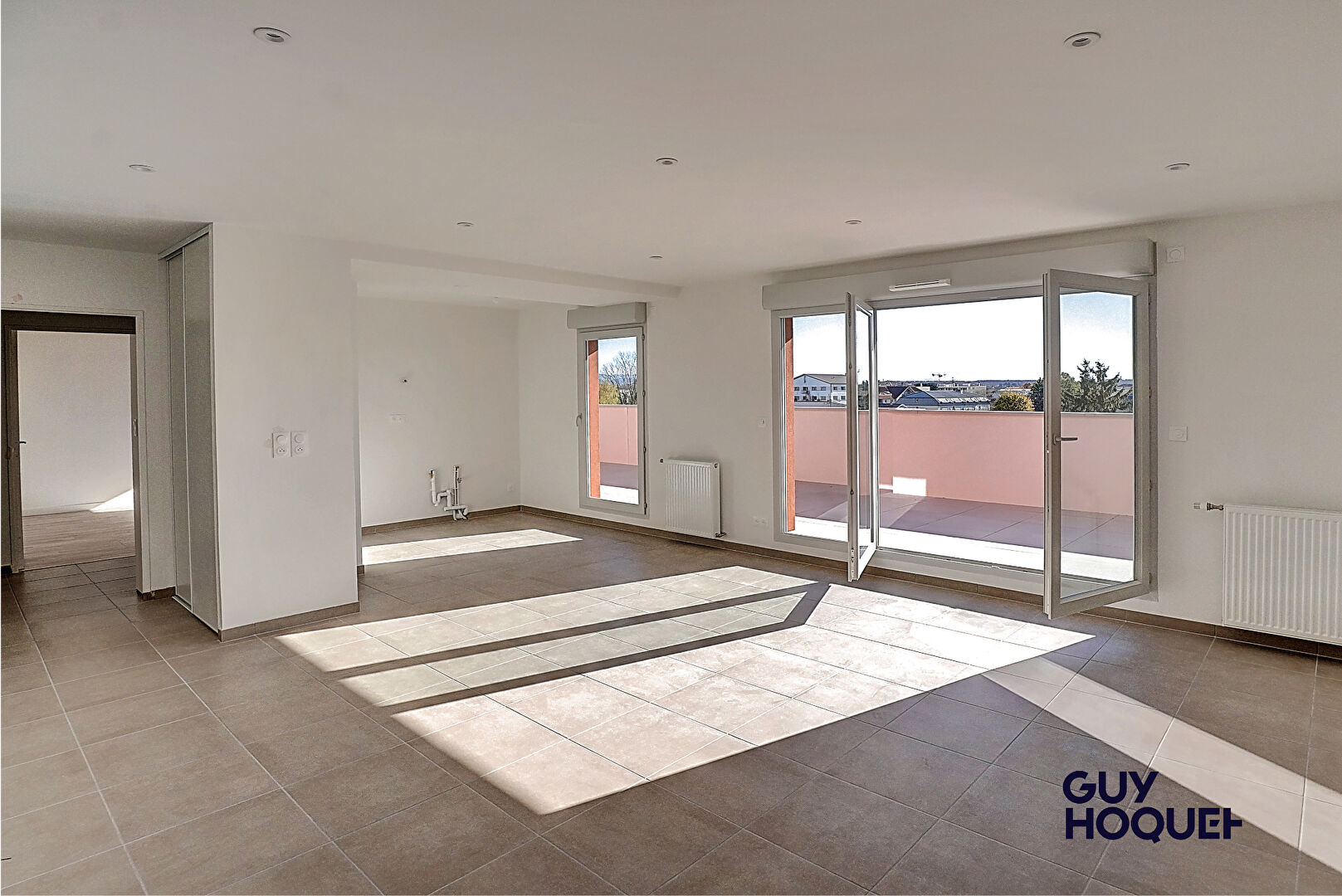 Appartement  en attique 4 pièces de 91 m²  avec double garage