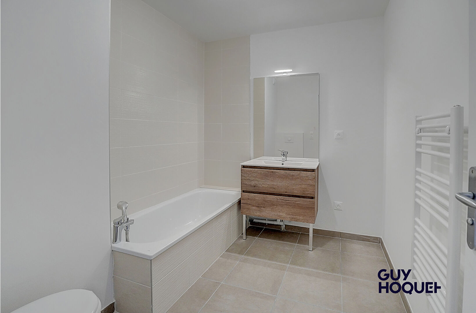 Appartement  en attique 4 pièces de 91 m²  avec double garage