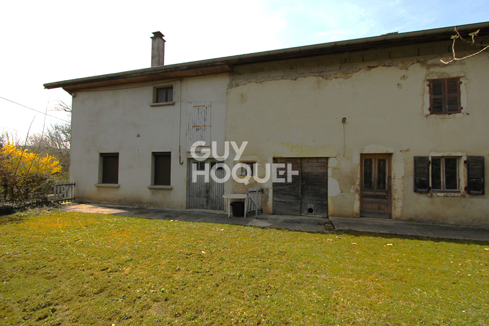 Deux grandes maisons mitoyennes