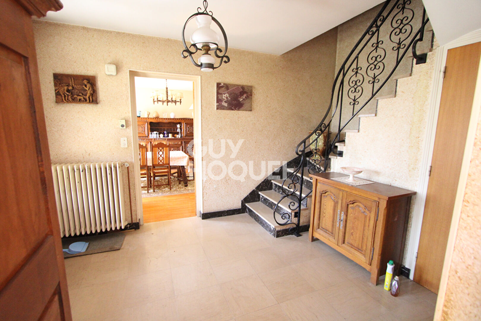 Deux grandes maisons mitoyennes