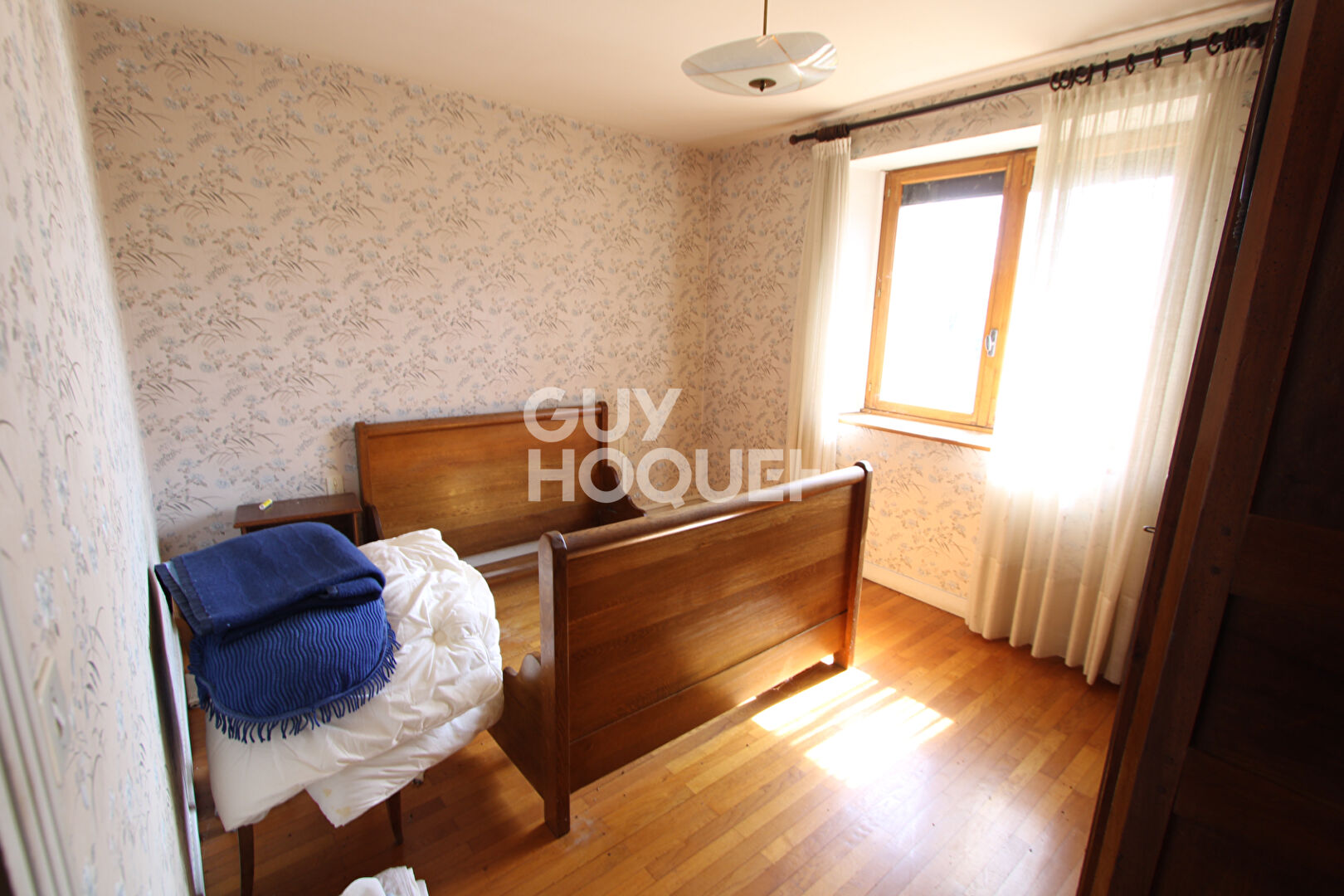 Deux grandes maisons mitoyennes