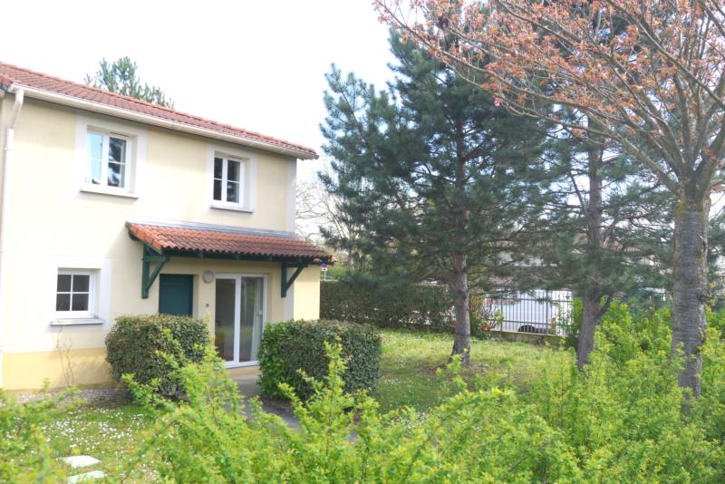 Maison mitoyenne avec jardin dans un écrin de verdure 
