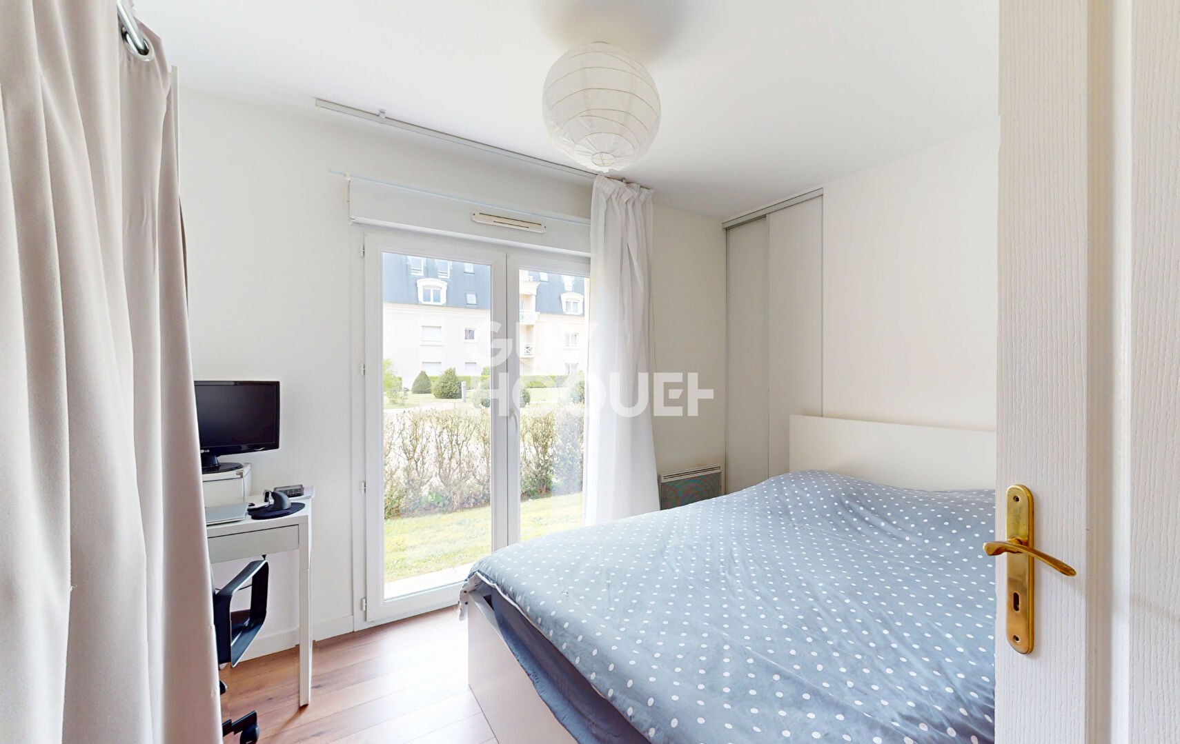 F2 rez-de-jardin + place de parking + cave