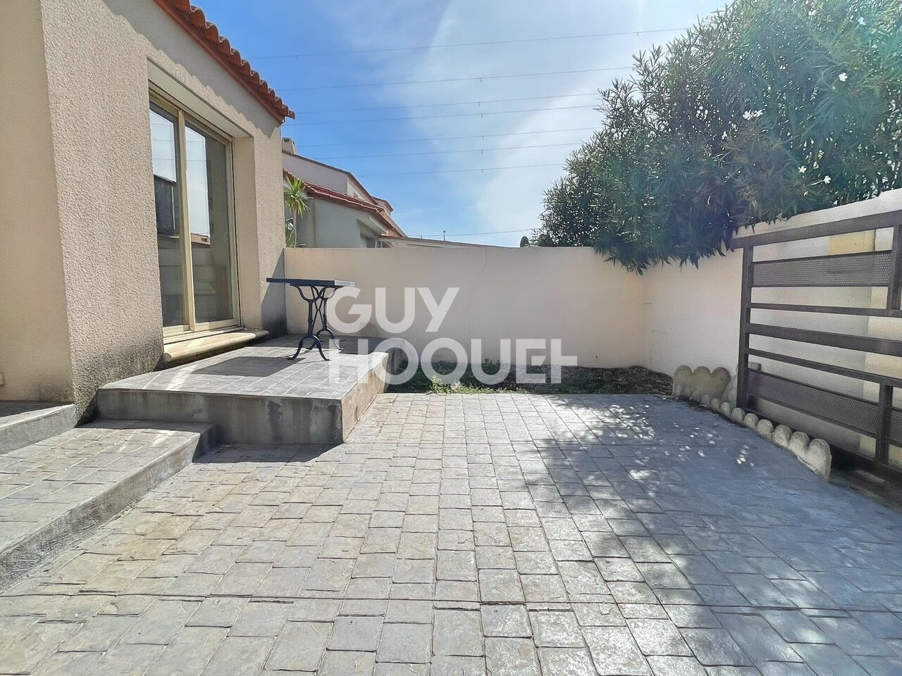 Maison à vendre à Canohès - 3 pièces, 67 m² de plain pied avec garage et jardin.