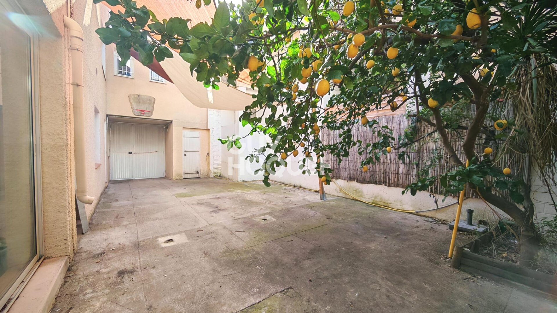 PERPIGNAN Quartier de la gare, à vendre maison familiale 7 pièces avec terrasse, cour et parking