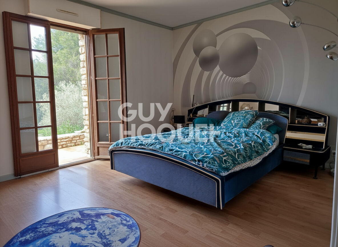 Propriété d'exception à Beaumes-de-Venise : maison en pierre de taille et parc de 5571 m².