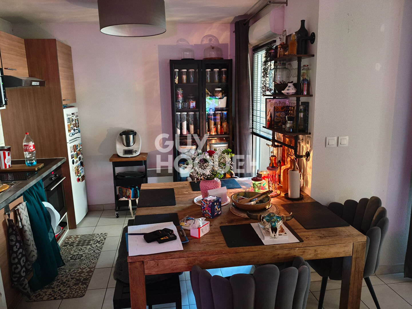 Appartement type 3 en rez-de-chaussée - 63 m² - balcon et stationnements dans résidence sécurisée -