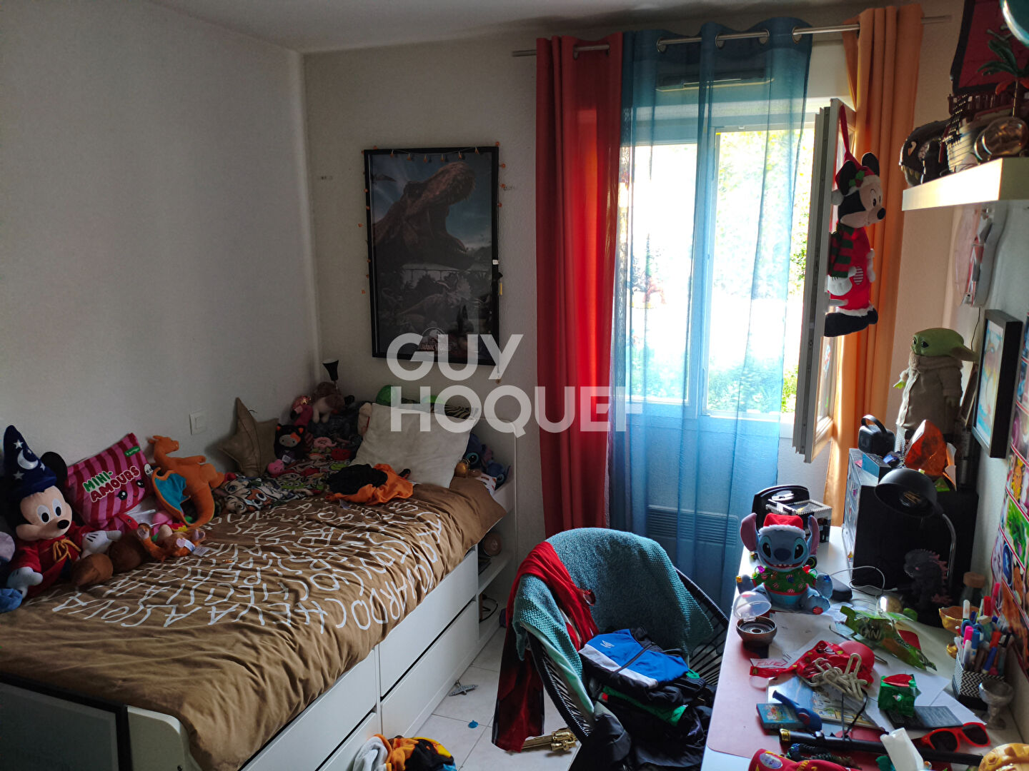 Appartement type 3 en rez-de-chaussée - 63 m² - balcon et stationnements dans résidence sécurisée -