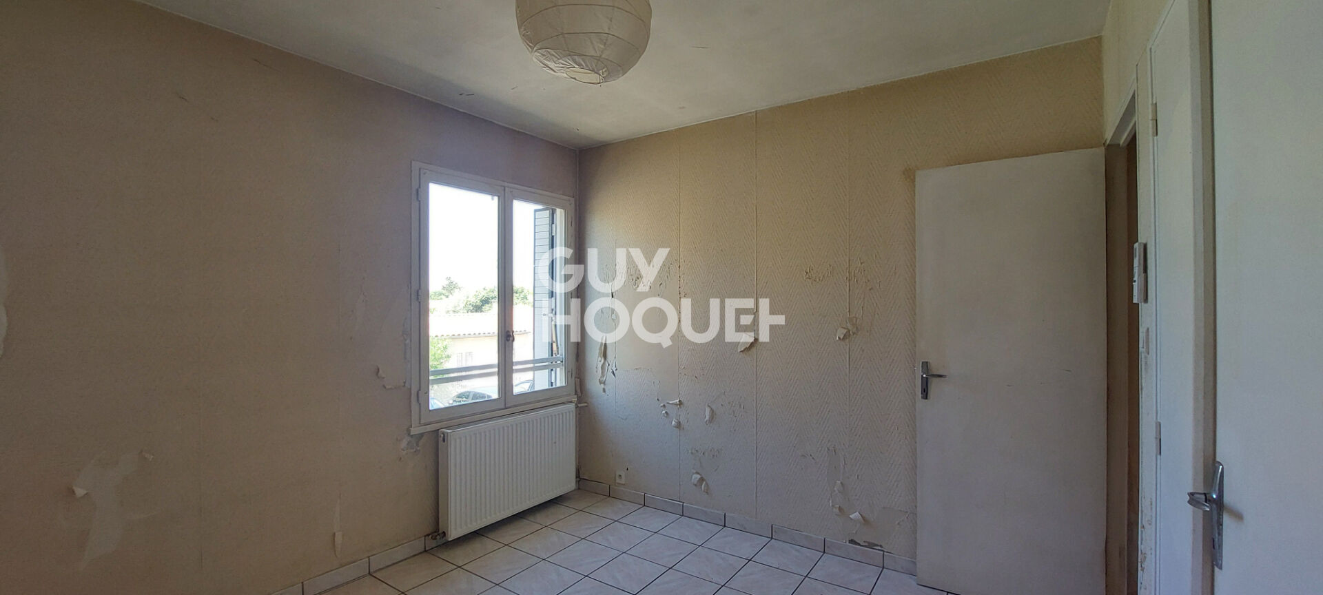 Appartement T3 de 63 m² (61.62 m² Loi Carrez) - 2 chambres - Terrasse - Cave et Stationnement
