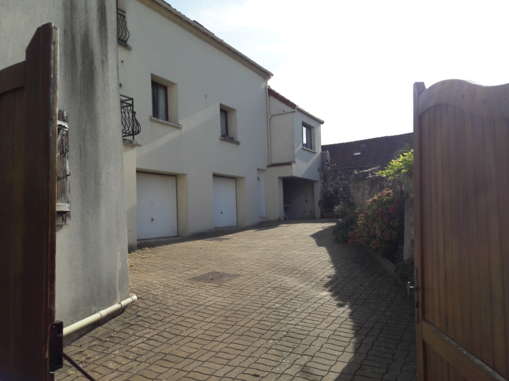 Duplex en centre ville avec grand garage
