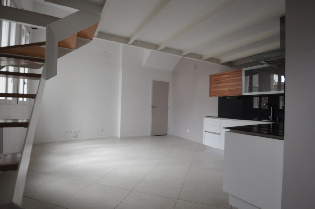 Appartement F1 bis en duplex avec coin nuit