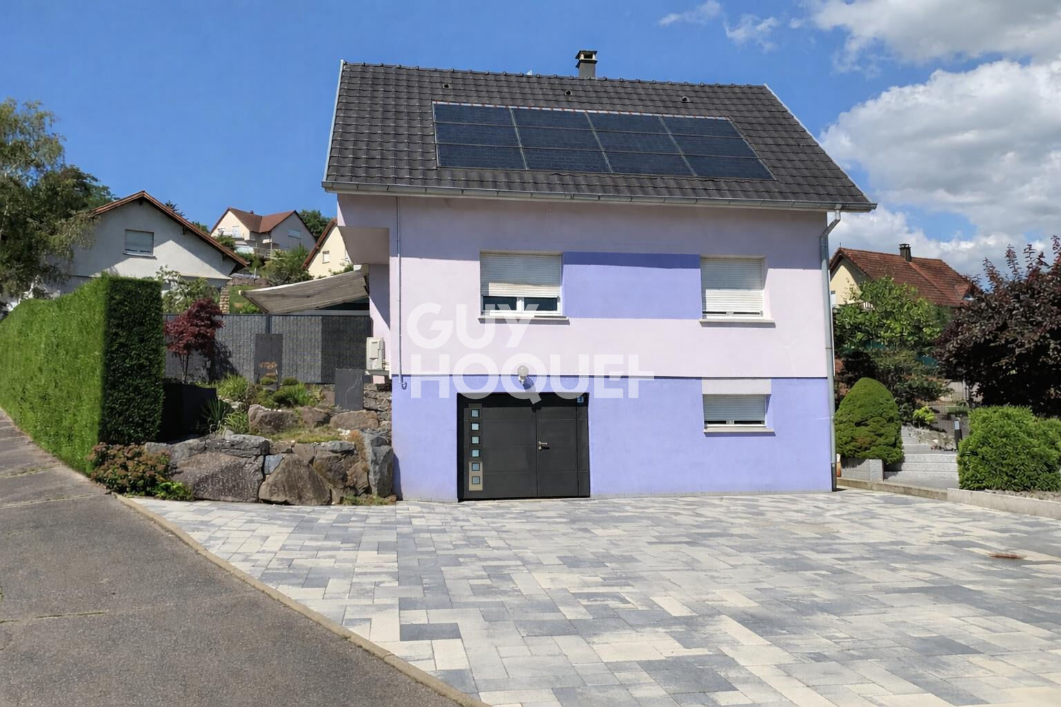 Maison spacieuse à vendre à Thann - 5 chambres et jardin