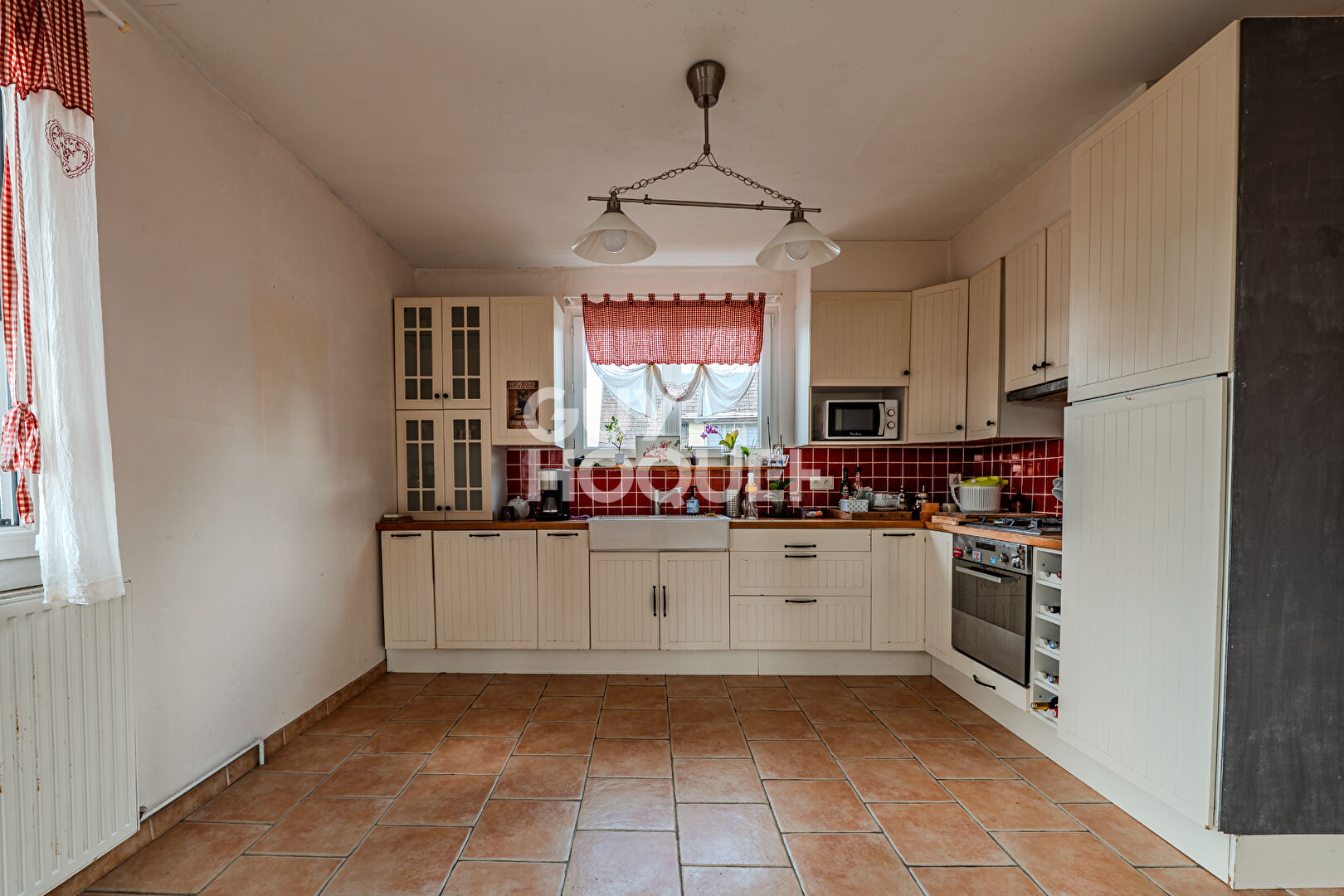 Maison individuelle avec sous-sol aménagé, jardin clos et accès à pied à toutes commodités