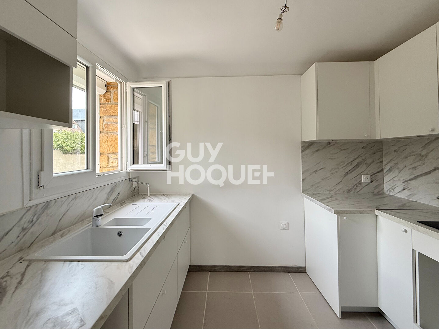APPARTEMENT 4 PIECES - JARDIN - PARKING - BLONVILLE SUR MER