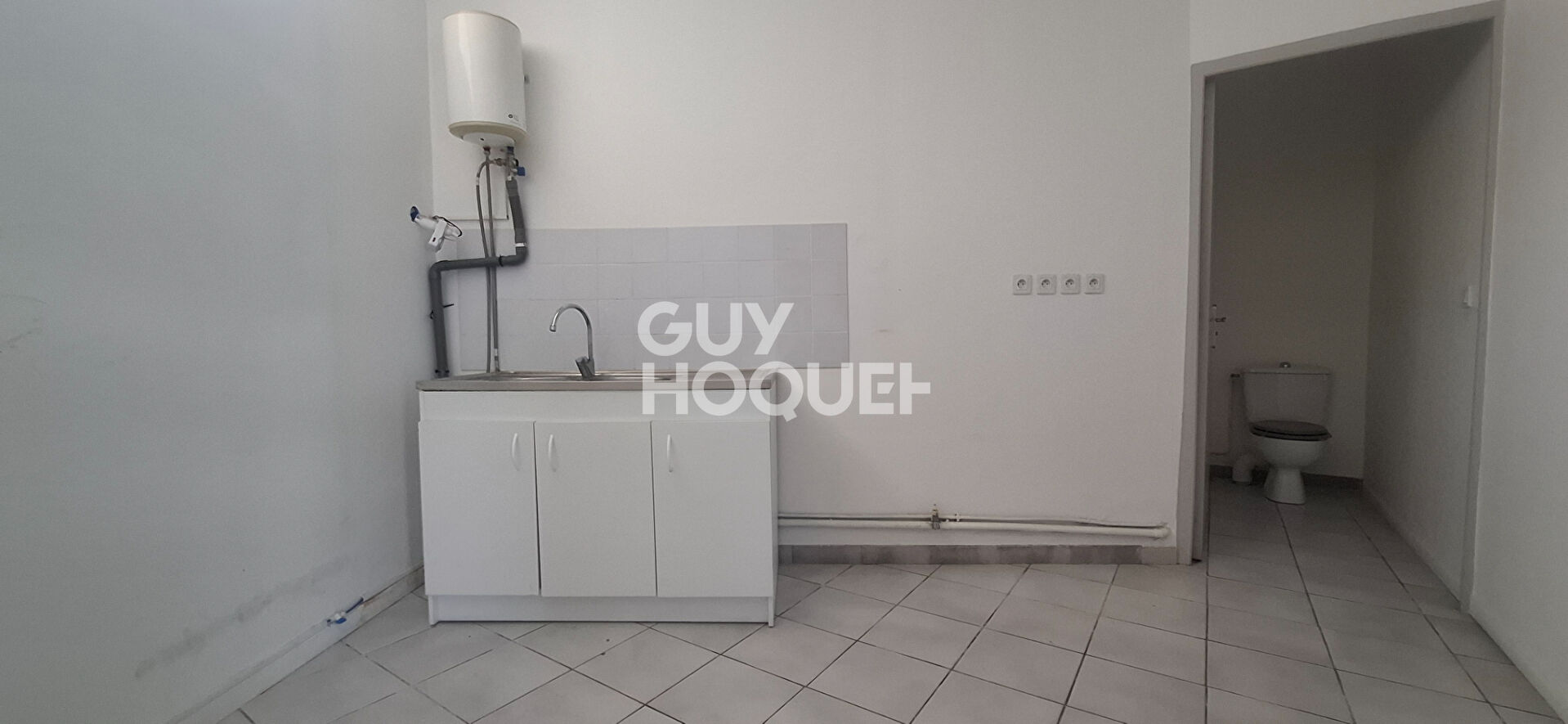 Local commercial Aubergenville 55 m2 de surface utile.