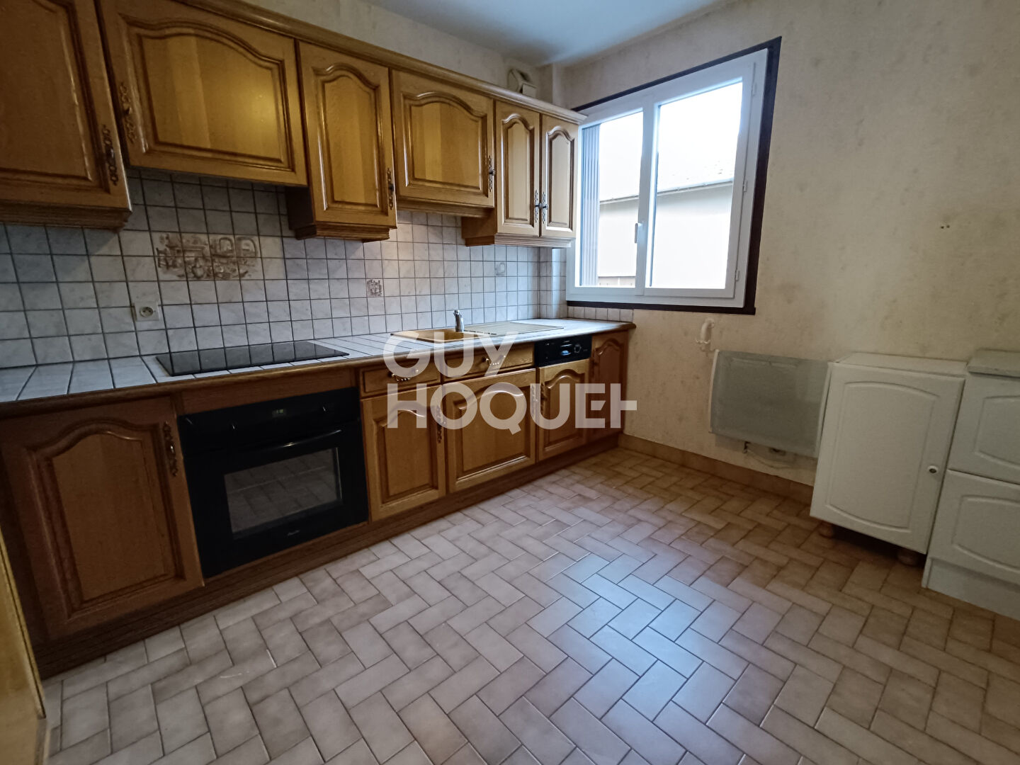 Appartement 3 pièces de 71 m² avec terrasse, garage et cave